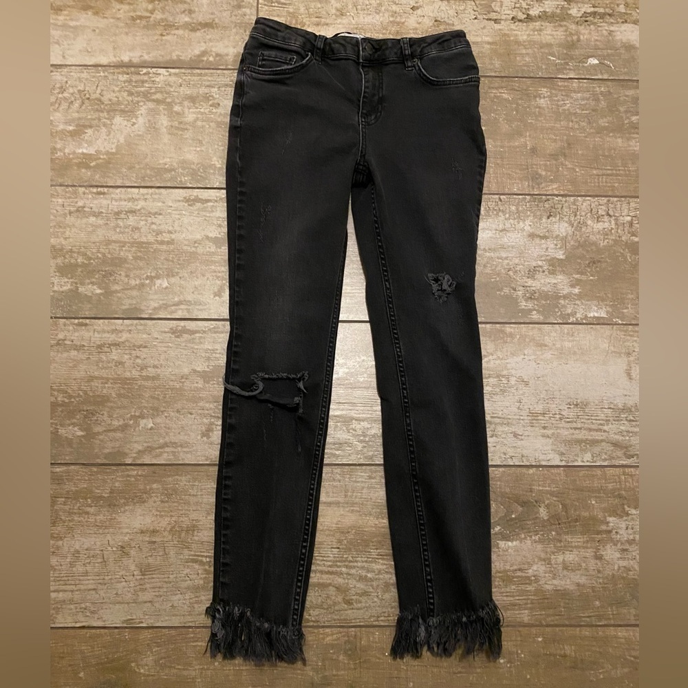 Free People black distressed raw hem skinny jeans